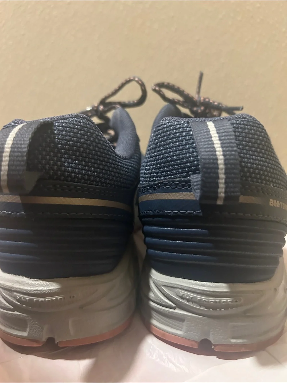 New Balance Women’s Navy with Rose Gold Accent Sneakers